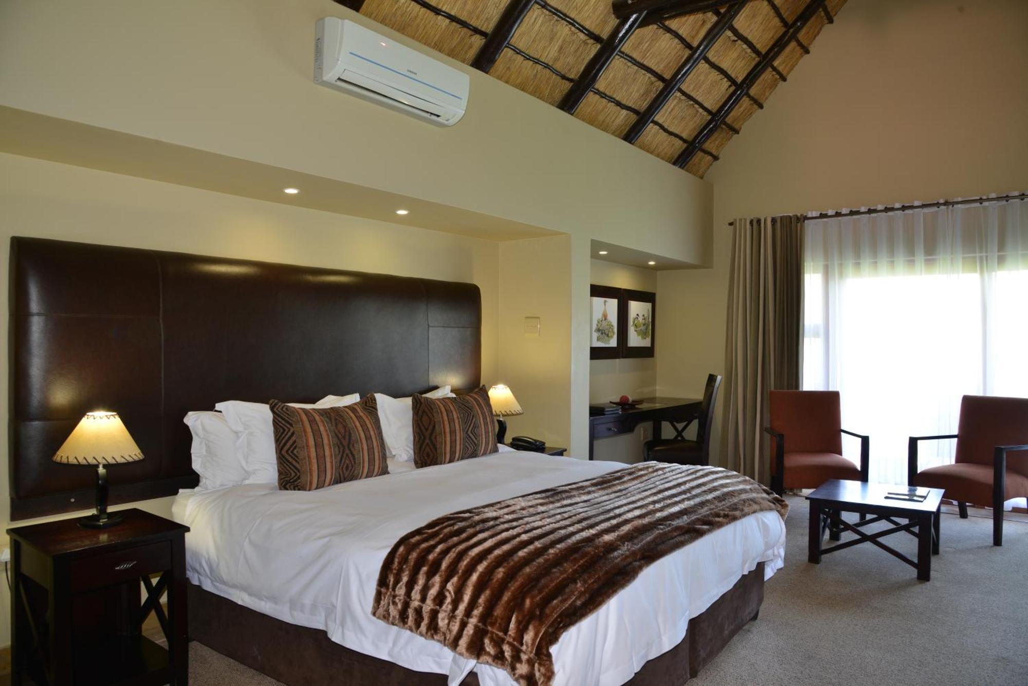 Kloofzicht Lodge & Spa クルーガーズドープ 部屋 写真 A bedroom at the Tintswalo Safari Estate